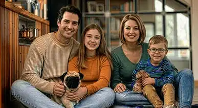 Inclusive representation of diverse families enjoying quality time together with their pet dog in a comfortable home.