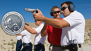 Male instructor in red shirt teaching other males in white shirts how shoot handguns at the shooting range.
